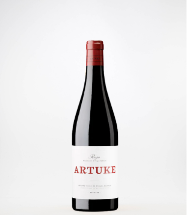 Red wine bottle with 'ARTUKE' label on a white background