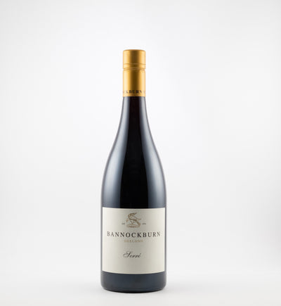 A bottle of 2023 Bannockburn Serre Pinot Noir wine with a magnum label, featuring a dark bottle and a gold-colored cap.
