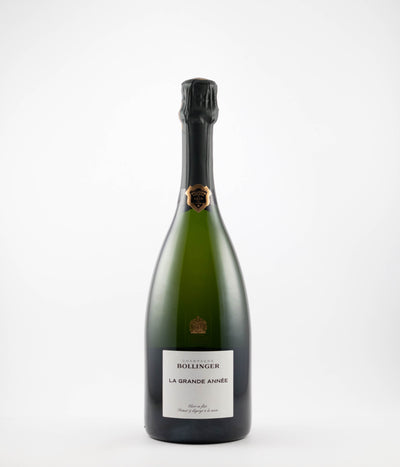A bottle of 2015 Bollinger Champagne La Grande Annee with a white label on a plain background.