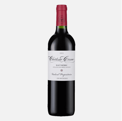 Red wine bottle with a Chateau Cissac label on a white background
