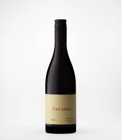 A bottle of  Decades Coal River Pinot Noir wine with a label that includes the name 'Decades' and the vintage '2013'.