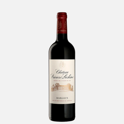 Red wine bottle with a visible Prieure-Lichine Margaux  label on a white background
