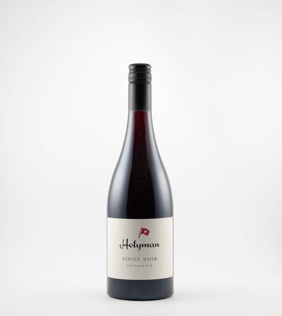 A bottle of 2023 Holyman Pinot Noir with a label showing the brand name and variety.